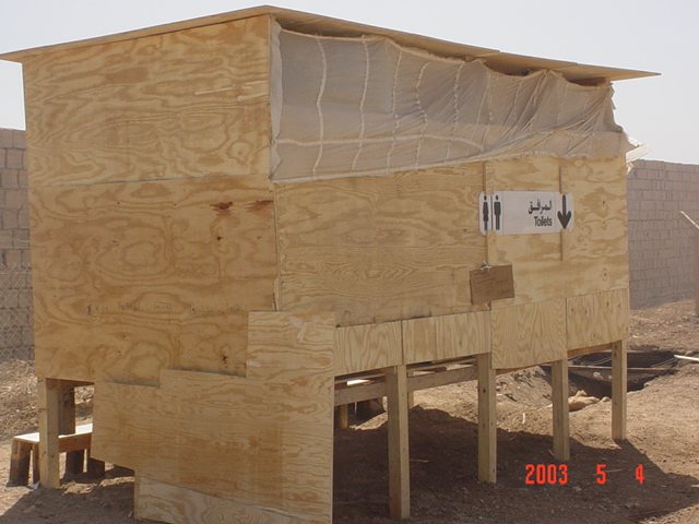 A plywood latrine built by the soldiers themselves, May 2003.